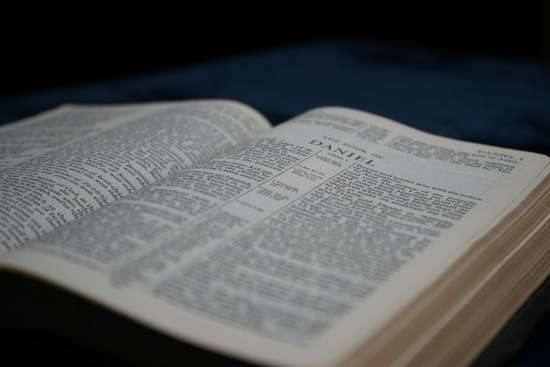A Bible open to Daniel, a key book for the sanctuary doctrine held by Adventists