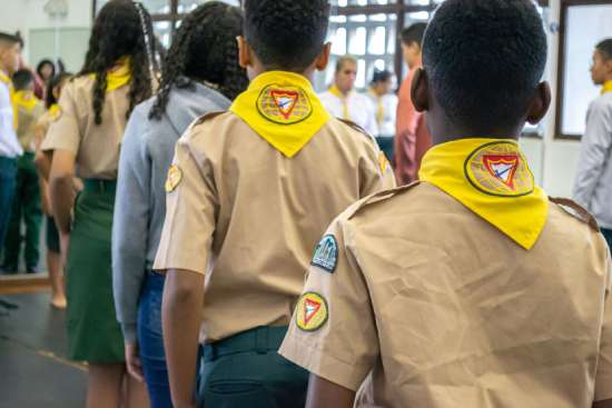 Pathfinders standing in a line Pathfinders in their uniforms lined up during marching practice