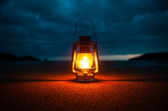 An oil-lamp shining in the dawn  A lamp to remind us of Jesus' teaching to be a light to the world